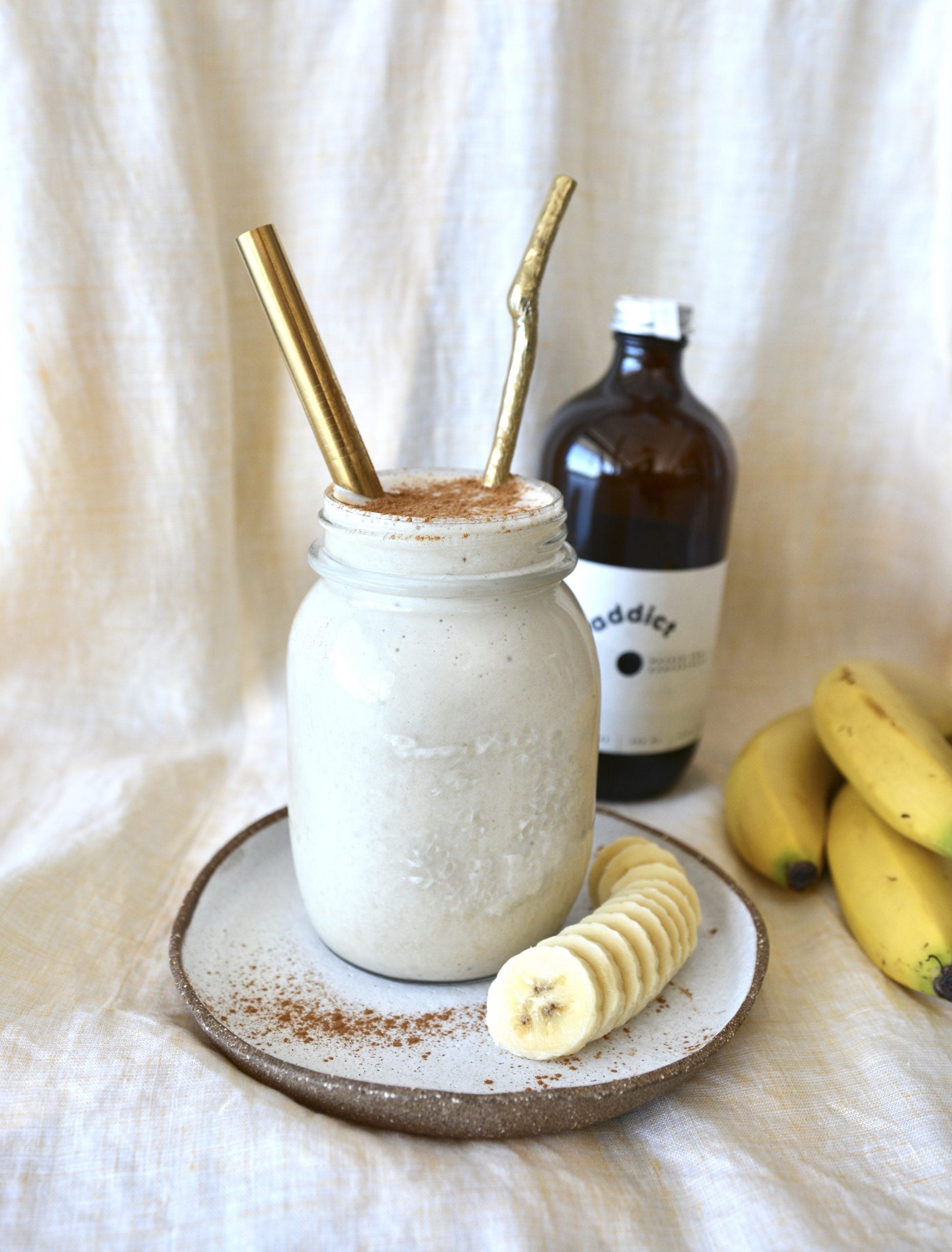 glass of Banana Chai Smoothie with banana coins
