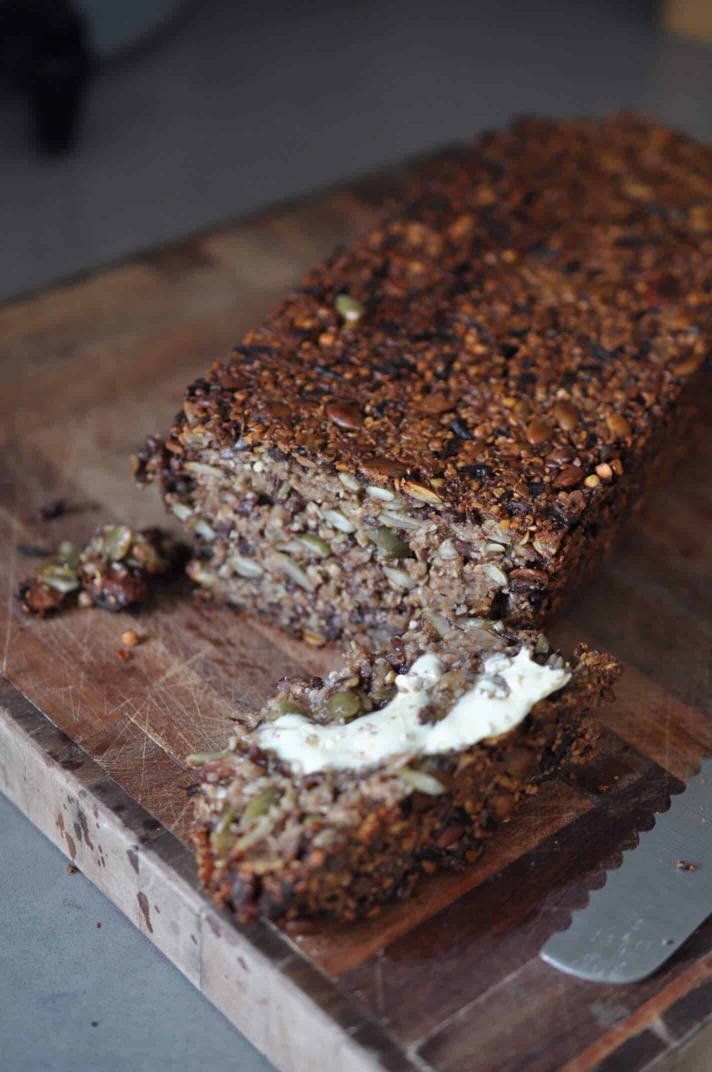 slices of seedy chai addict loaf with butter