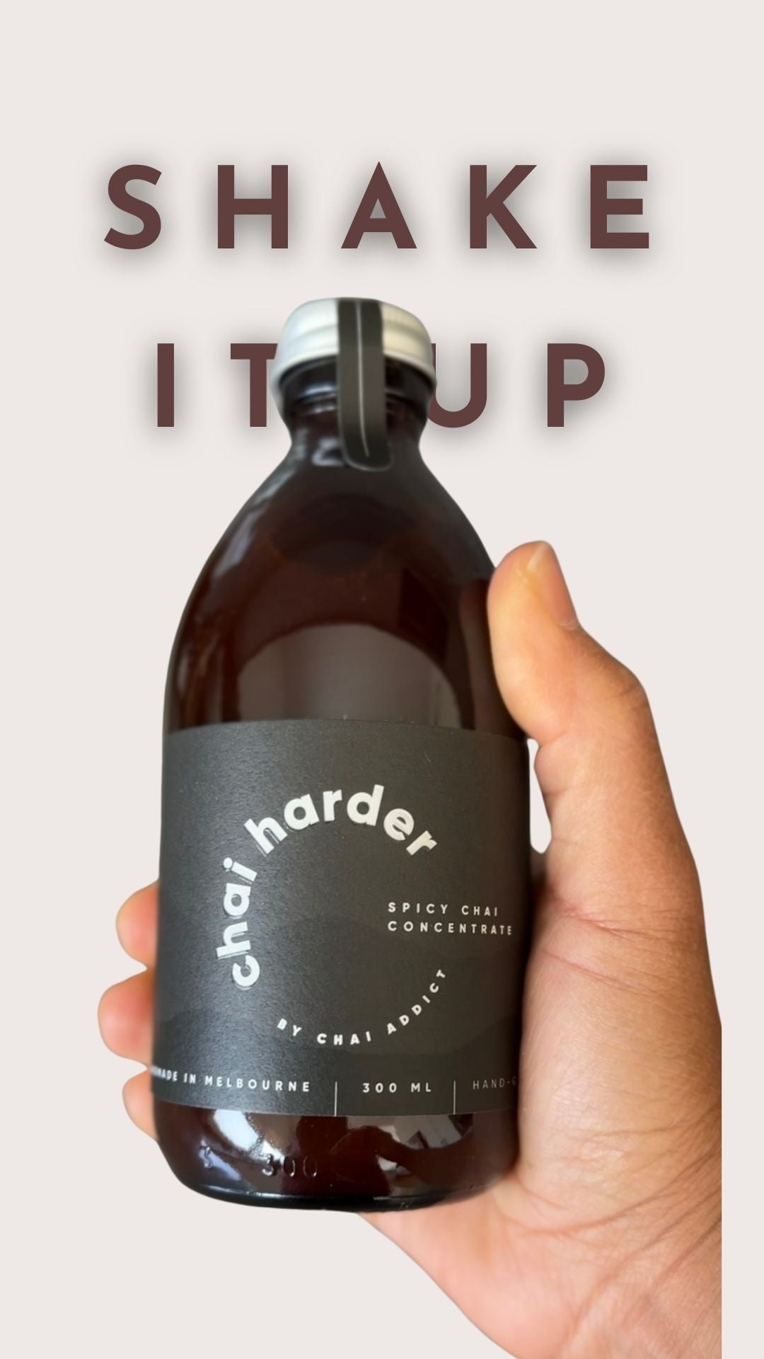 bottle of chai harder with text shake it up