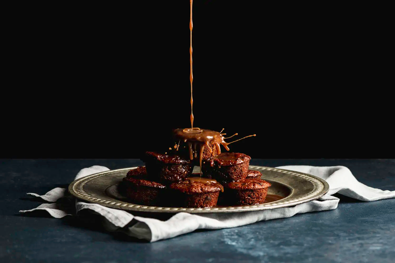 spongy sticky-icky chai date pudding drizzled with chai caramel sauce