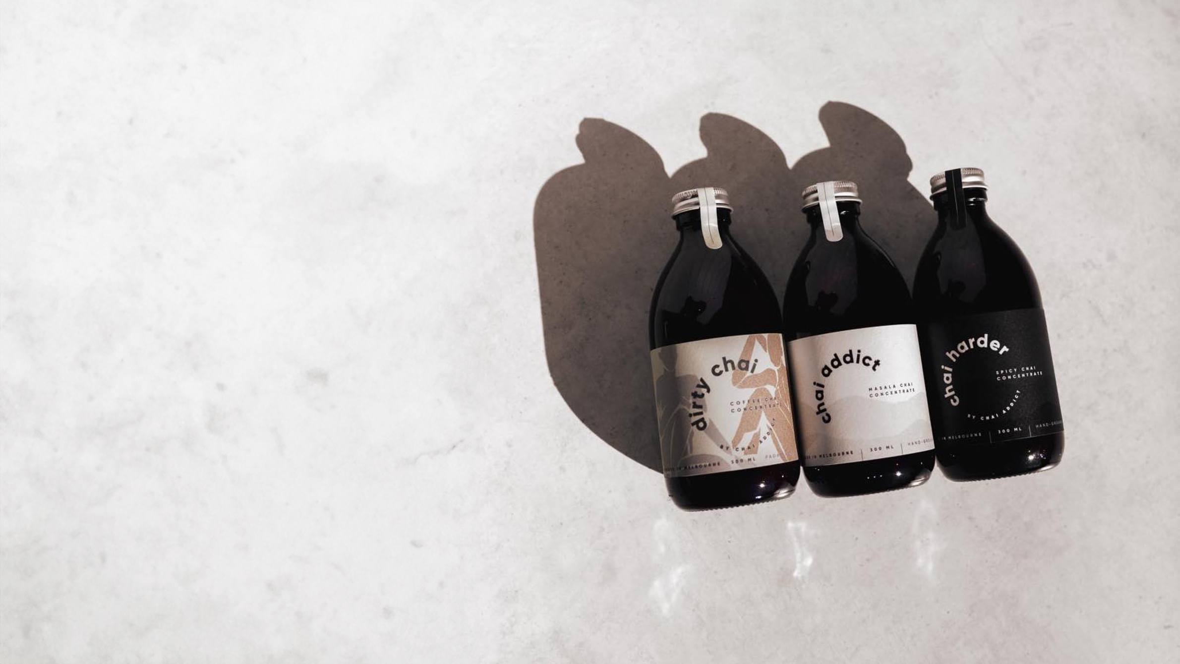 3 bottles of 300ml chai latte concentrates from left to right: dirty chai, chai addict, chai harder