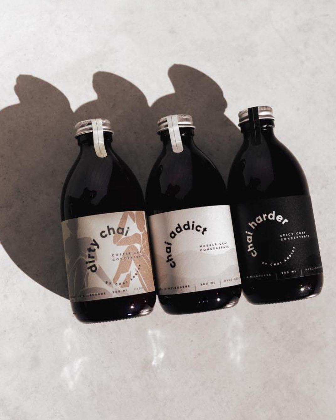 Assorted chai concentrate trio packs arranged in a captivating banner, offering a delightful variety for chai enthusiasts